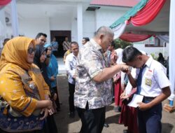 Bupati Asahan Serahkan BPJS Kesehatan Gratis dan KIP Kepada Masyarakat di 4 Kecamatan