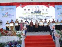 Bupati Asahan Terima Penghargaan di Puncak Harganas Ke-32 Provinsi Sumut