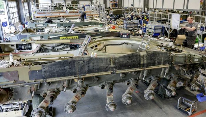 German Arms Race: Defense Giants Clash Over Spending Surge