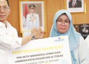 Jaminan Sosial ASN Diperkuat, Amsakar Serahkan Santunan dan Beasiswa untuk Ahli Waris